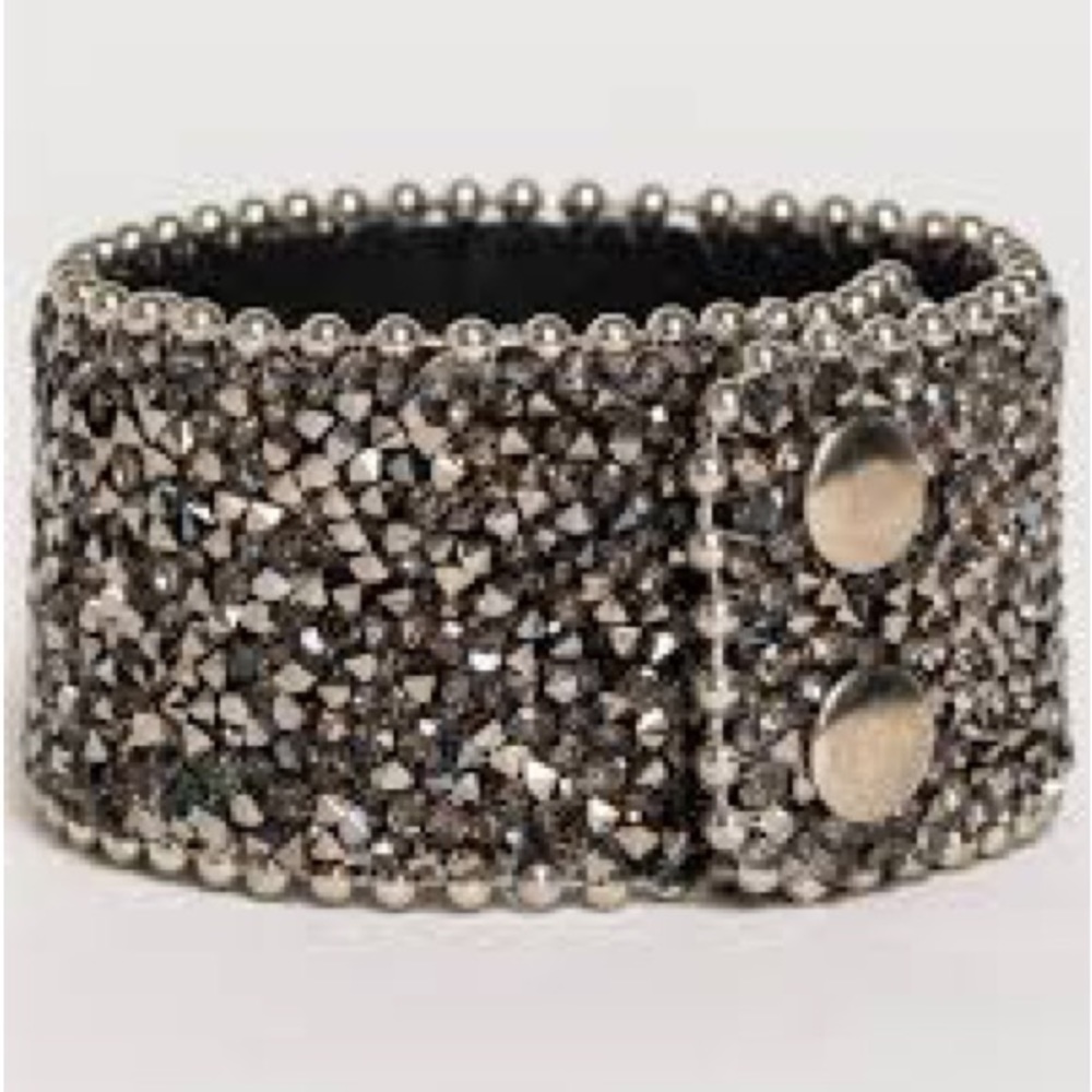 The Shyanne Women’s Crystal Snap Cuff Bracelet with crystal gems and studs.